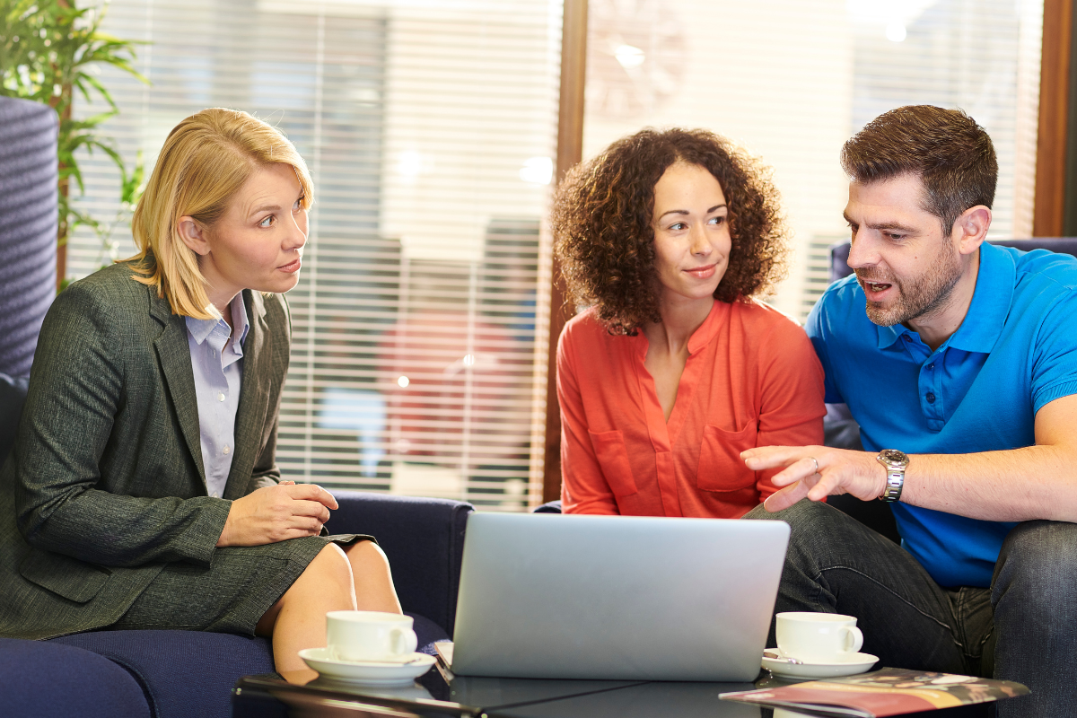 married-couple-talking-to-banker-about-their-finances